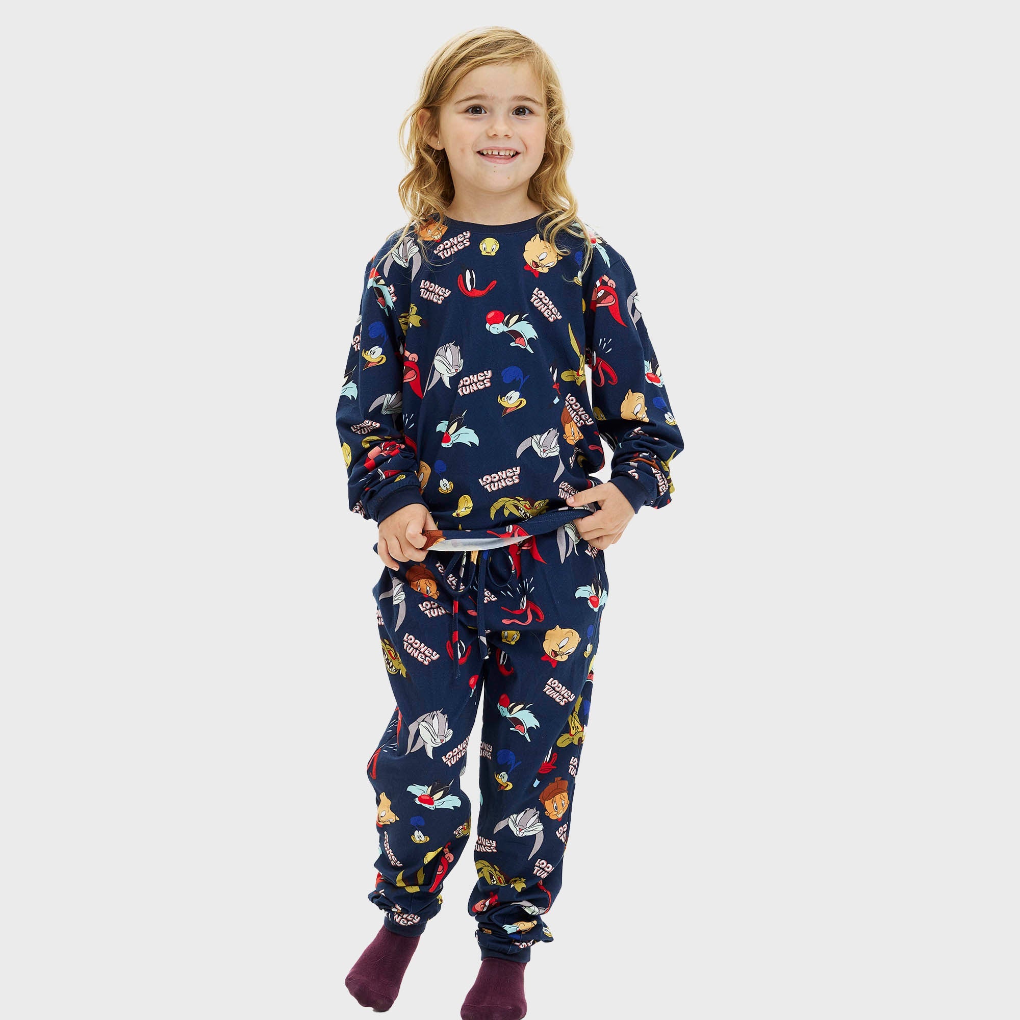Dunkelblauer Looney Tunes Weihnachtspyjama Kinder mit bunter Cartoon-Motivprint, langärmelig, gemütlich.